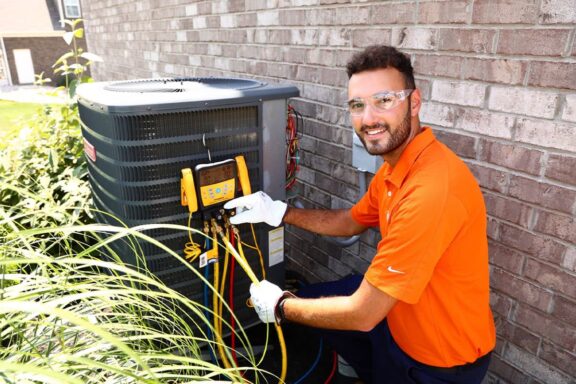 Airtron Louisville HVAC technician during a home repair
